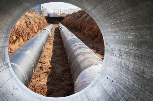 installation of a sewage plastic pipe during the construction of a house. Creative Banner. Copyspace image