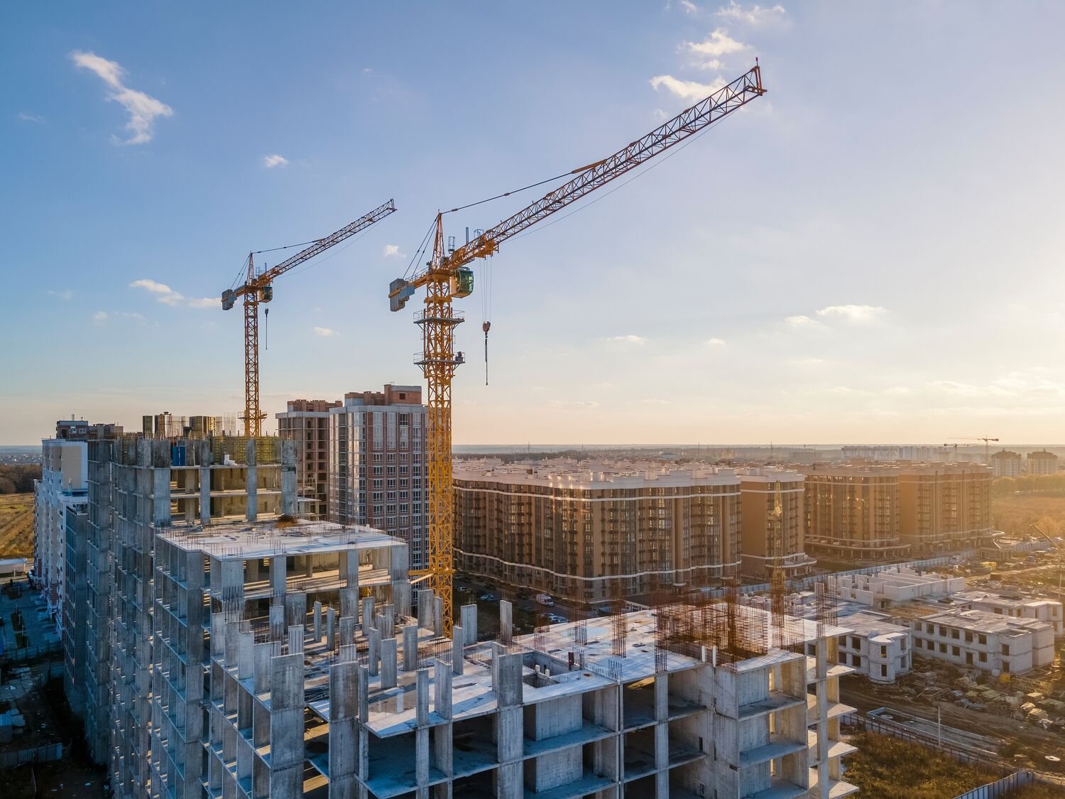 Construction building site with cranes