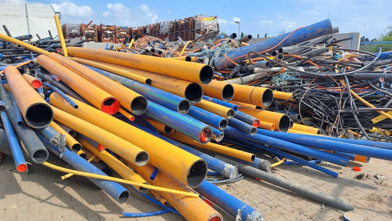 Collected used plastic pipes for recycling