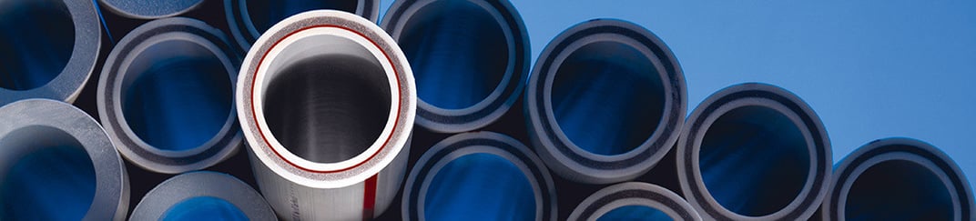 installation of a sewage plastic pipe during the construction of a house. Creative Banner. Copyspace image