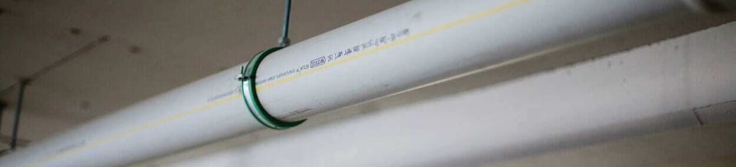 installation of a sewage plastic pipe during the construction of a house. Creative Banner. Copyspace image