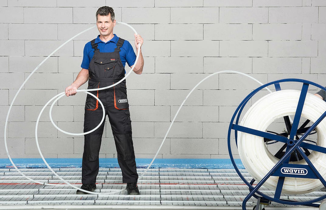 installation of a sewage plastic pipe during the construction of a house. Creative Banner. Copyspace image