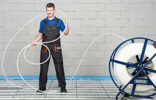 installation of a sewage plastic pipe during the construction of a house. Creative Banner. Copyspace image