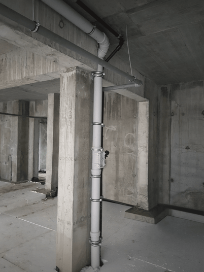 installation of a sewage plastic pipe during the construction of a house. Creative Banner. Copyspace image