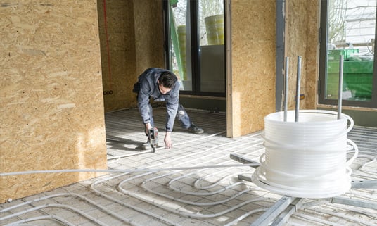 installation of a sewage plastic pipe during the construction of a house. Creative Banner. Copyspace image