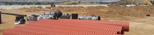 installation of a sewage plastic pipe during the construction of a house. Creative Banner. Copyspace image