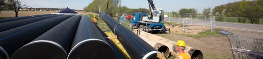 installation of a sewage plastic pipe during the construction of a house. Creative Banner. Copyspace image