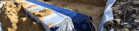 installation of a sewage plastic pipe during the construction of a house. Creative Banner. Copyspace image
