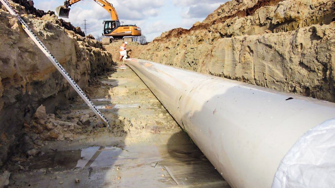 installation of a sewage plastic pipe during the construction of a house. Creative Banner. Copyspace image