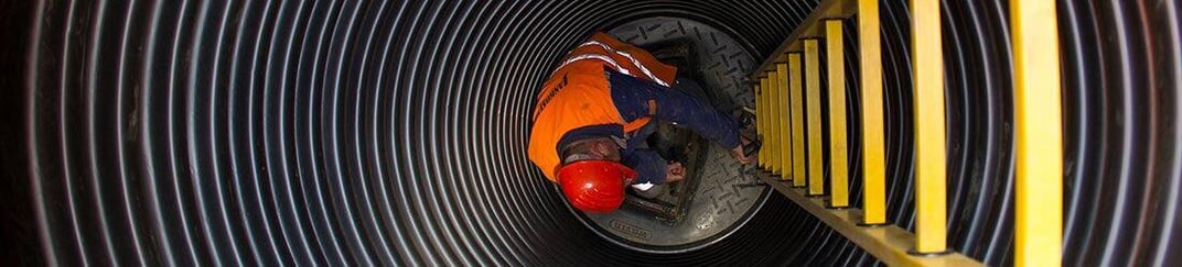 installation of a sewage plastic pipe during the construction of a house. Creative Banner. Copyspace image