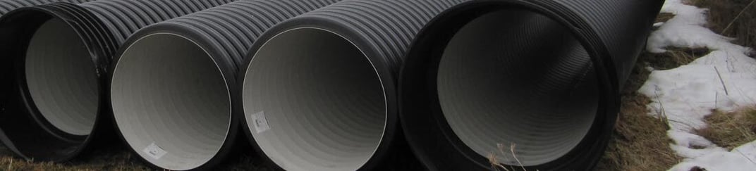 installation of a sewage plastic pipe during the construction of a house. Creative Banner. Copyspace image