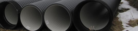 installation of a sewage plastic pipe during the construction of a house. Creative Banner. Copyspace image