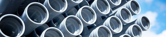 installation of a sewage plastic pipe during the construction of a house. Creative Banner. Copyspace image