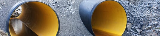 installation of a sewage plastic pipe during the construction of a house. Creative Banner. Copyspace image