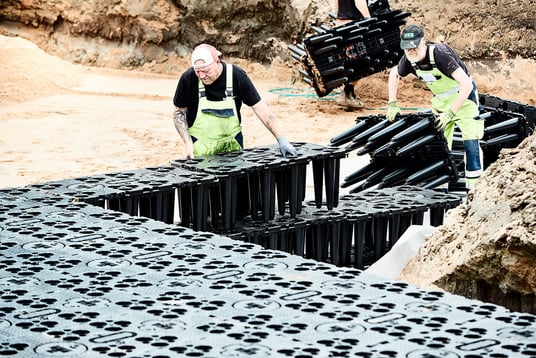 installation of a sewage plastic pipe during the construction of a house. Creative Banner. Copyspace image