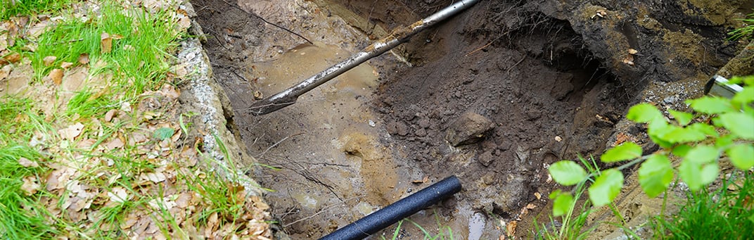 installation of a sewage plastic pipe during the construction of a house. Creative Banner. Copyspace image