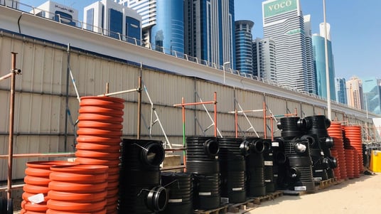 installation of a sewage plastic pipe during the construction of a house. Creative Banner. Copyspace image