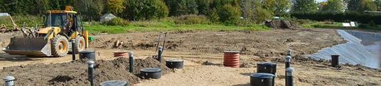 installation of a sewage plastic pipe during the construction of a house. Creative Banner. Copyspace image