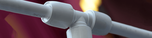 installation of a sewage plastic pipe during the construction of a house. Creative Banner. Copyspace image