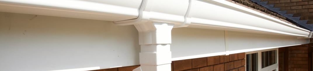 installation of a sewage plastic pipe during the construction of a house. Creative Banner. Copyspace image