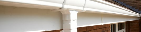 installation of a sewage plastic pipe during the construction of a house. Creative Banner. Copyspace image