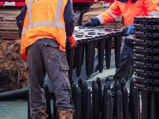 installation of a sewage plastic pipe during the construction of a house. Creative Banner. Copyspace image