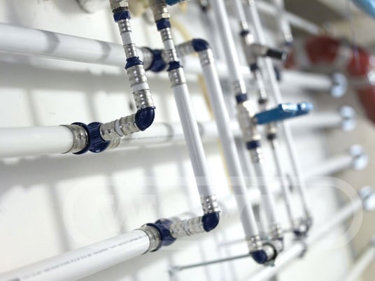 installation of a sewage plastic pipe during the construction of a house. Creative Banner. Copyspace image