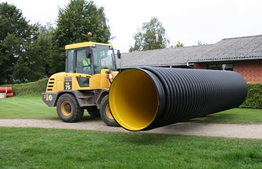 installation of a sewage plastic pipe during the construction of a house. Creative Banner. Copyspace image