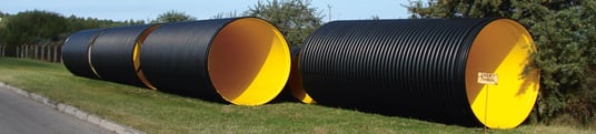 installation of a sewage plastic pipe during the construction of a house. Creative Banner. Copyspace image