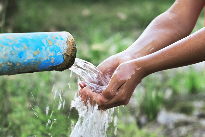 installation of a sewage plastic pipe during the construction of a house. Creative Banner. Copyspace image