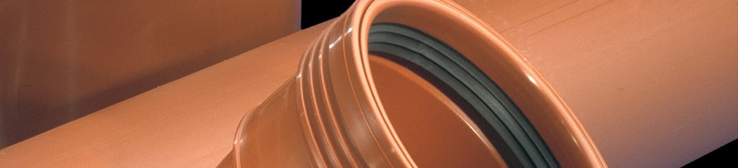 installation of a sewage plastic pipe during the construction of a house. Creative Banner. Copyspace image
