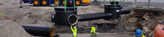 installation of a sewage plastic pipe during the construction of a house. Creative Banner. Copyspace image