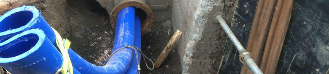 installation of a sewage plastic pipe during the construction of a house. Creative Banner. Copyspace image