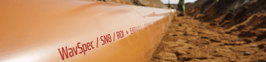 installation of a sewage plastic pipe during the construction of a house. Creative Banner. Copyspace image