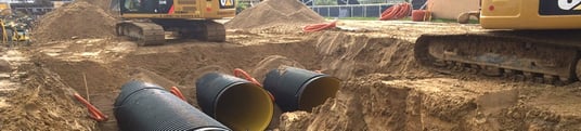 installation of a sewage plastic pipe during the construction of a house. Creative Banner. Copyspace image