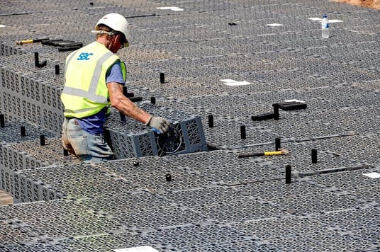 installation of a sewage plastic pipe during the construction of a house. Creative Banner. Copyspace image