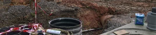 installation of a sewage plastic pipe during the construction of a house. Creative Banner. Copyspace image