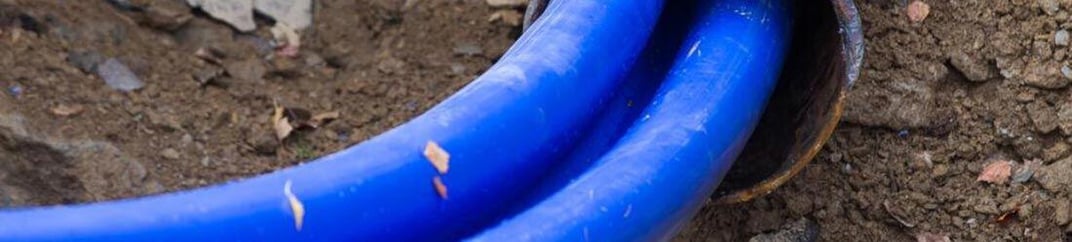 installation of a sewage plastic pipe during the construction of a house. Creative Banner. Copyspace image