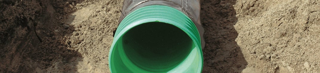 installation of a sewage plastic pipe during the construction of a house. Creative Banner. Copyspace image