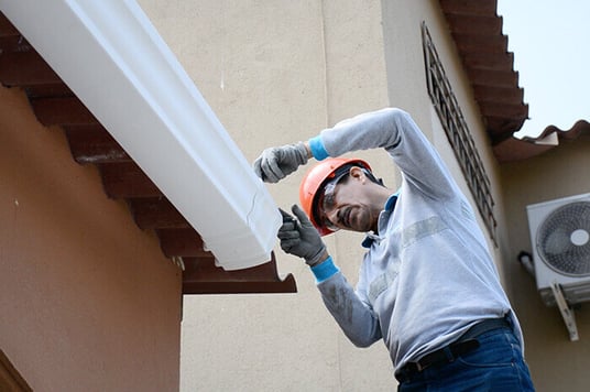 installation of a sewage plastic pipe during the construction of a house. Creative Banner. Copyspace image