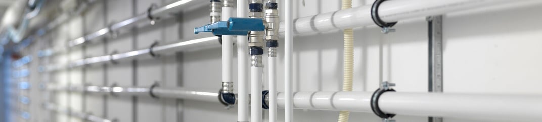 installation of a sewage plastic pipe during the construction of a house. Creative Banner. Copyspace image