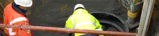 installation of a sewage plastic pipe during the construction of a house. Creative Banner. Copyspace image