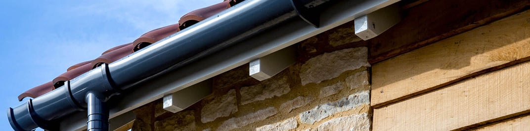 installation of a sewage plastic pipe during the construction of a house. Creative Banner. Copyspace image