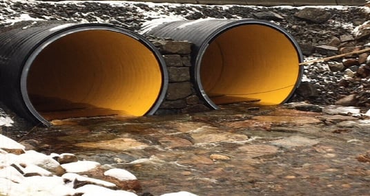 installation of a sewage plastic pipe during the construction of a house. Creative Banner. Copyspace image