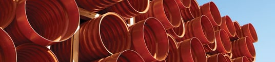 installation of a sewage plastic pipe during the construction of a house. Creative Banner. Copyspace image