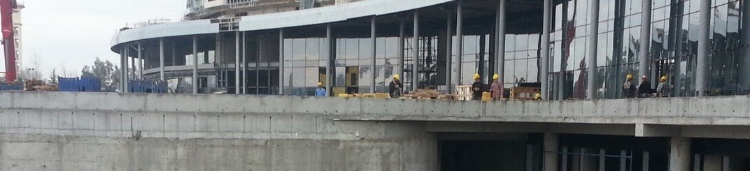 installation of a sewage plastic pipe during the construction of a house. Creative Banner. Copyspace image
