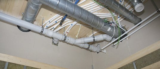 installation of a sewage plastic pipe during the construction of a house. Creative Banner. Copyspace image