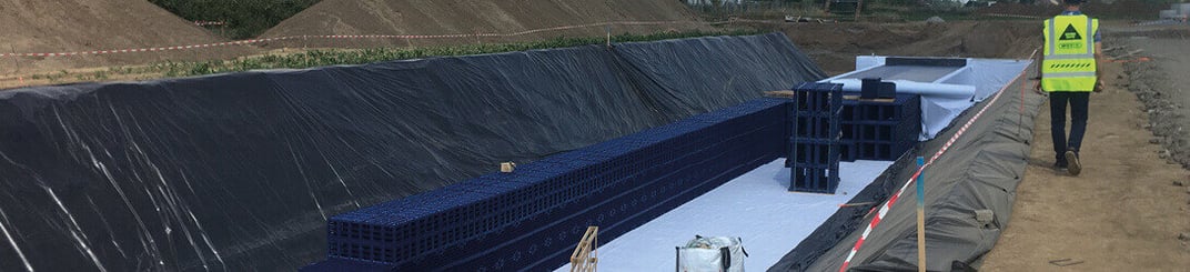 installation of a sewage plastic pipe during the construction of a house. Creative Banner. Copyspace image