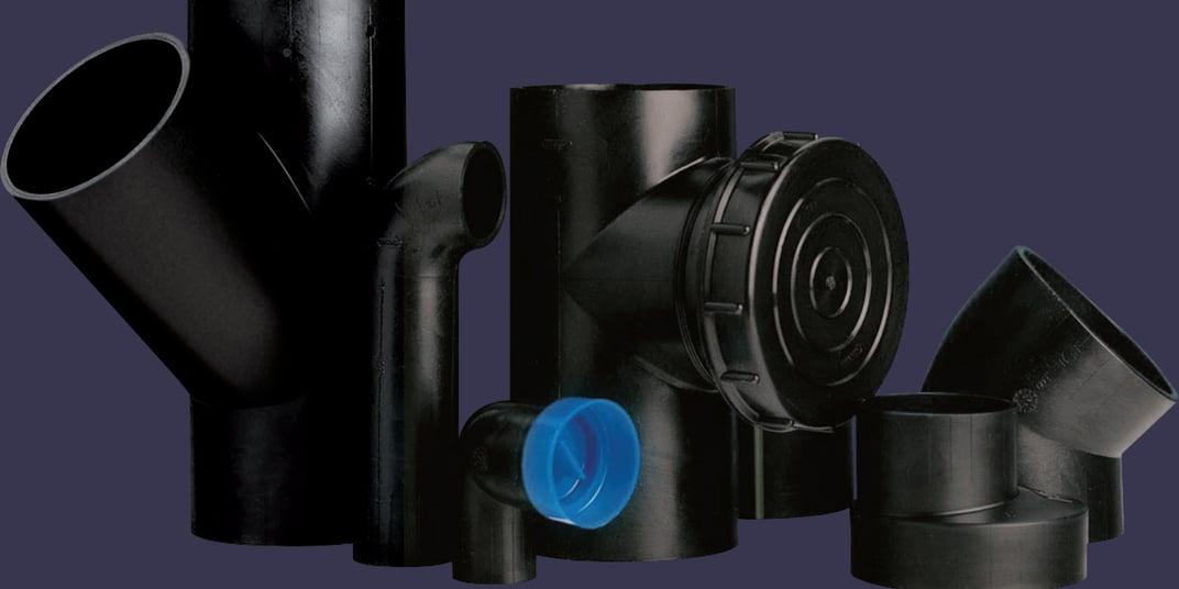installation of a sewage plastic pipe during the construction of a house. Creative Banner. Copyspace image