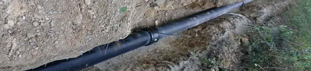 installation of a sewage plastic pipe during the construction of a house. Creative Banner. Copyspace image
